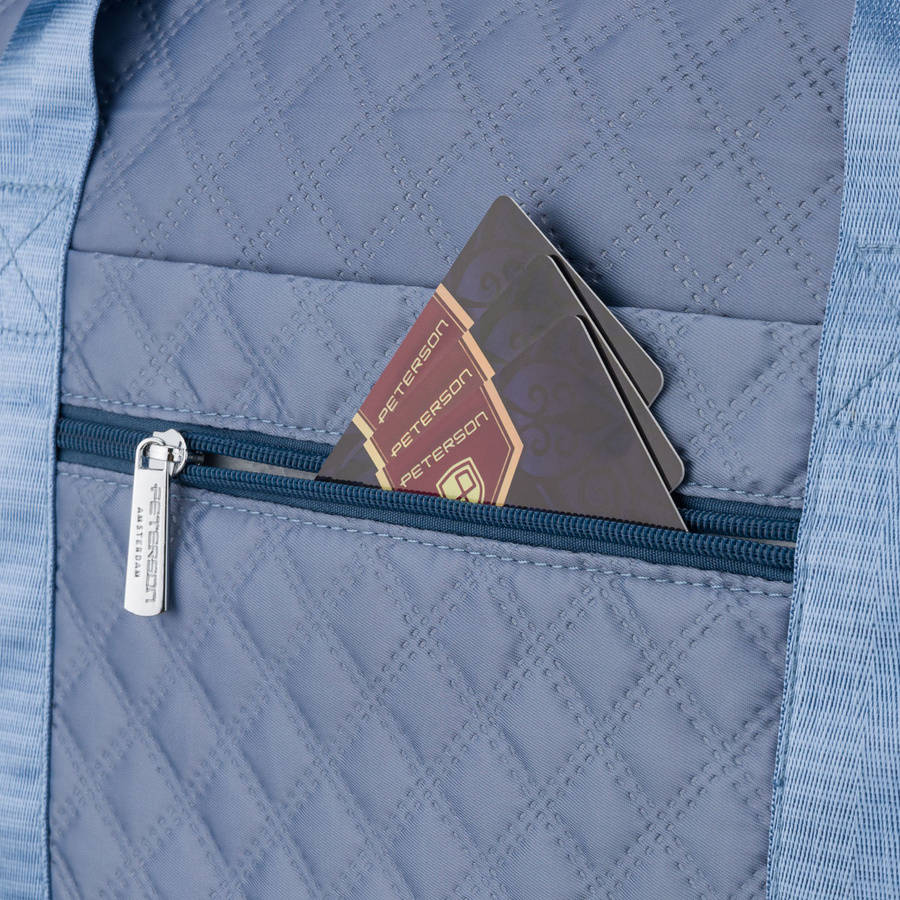 Treningowa torba wykonana z poliestru w niebieskim kolorze, wyposażona w uchwyt na walizkę - Peterson