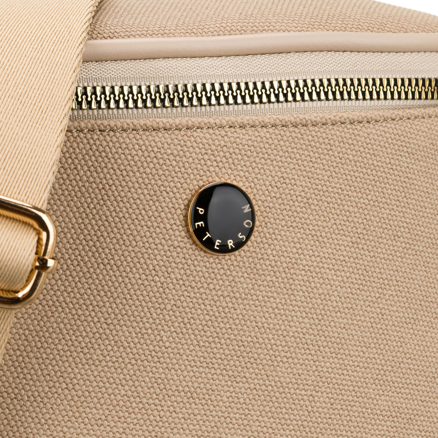 Beżowa saszetka damska zamykana suwakiem i zawieszona na regulowanym pasku - Peterson