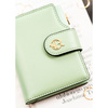 Pionowy portfel damski ze skóry ekologicznej w zielonym kolorze, zamykany na zatrzask i suwak - Rovicky