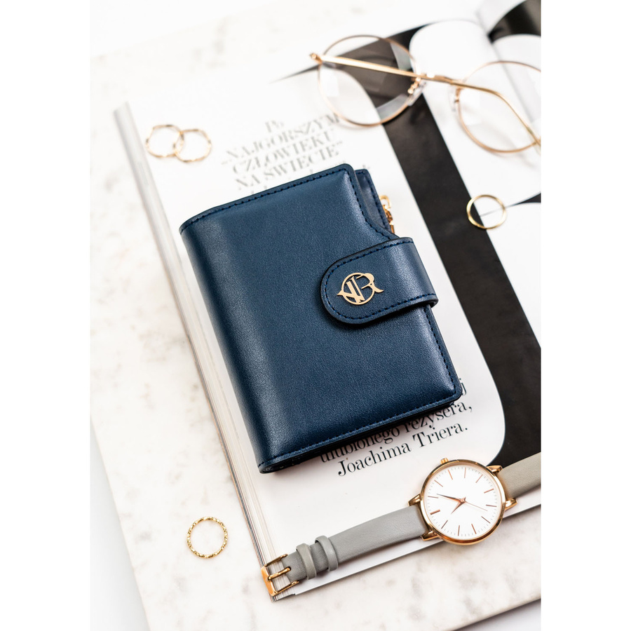 Granatowy portfel damski ze skóry ekologicznej zamykany na zatrzask i suwak - Rovicky