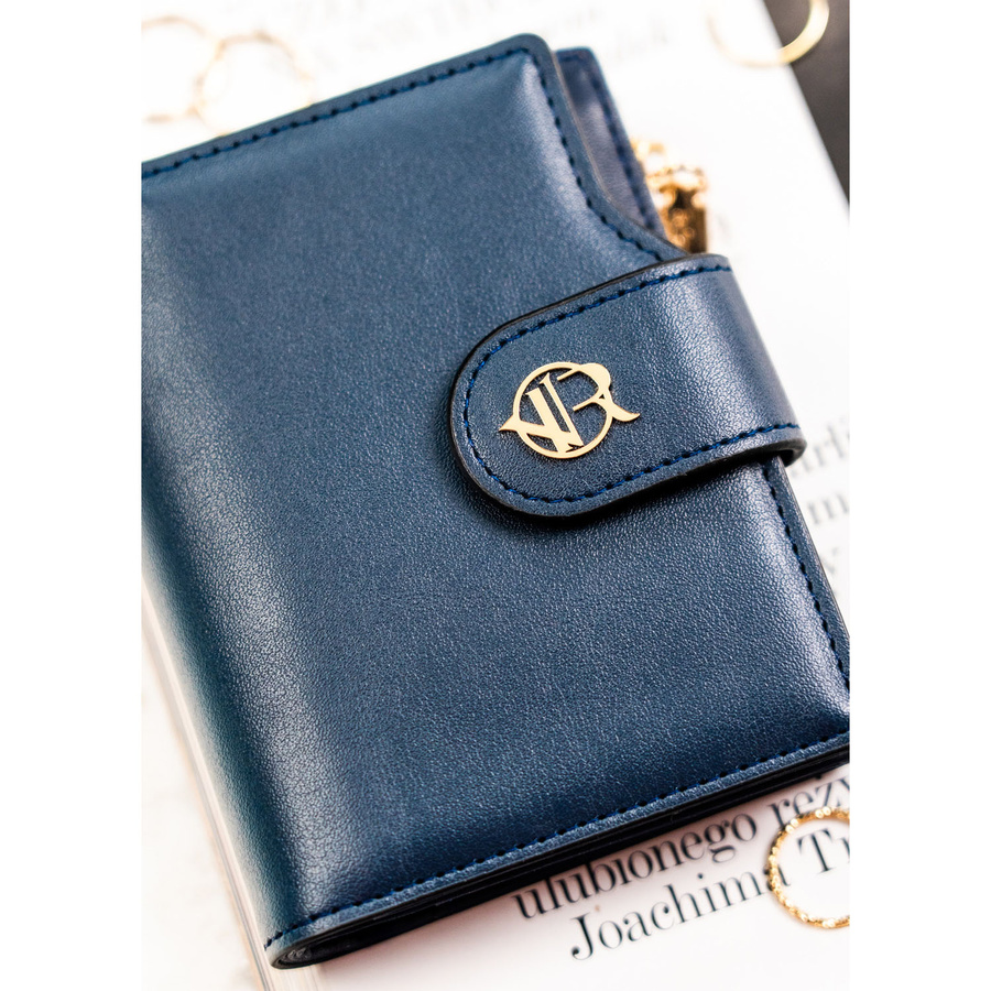 Granatowy portfel damski ze skóry ekologicznej zamykany na zatrzask i suwak - Rovicky