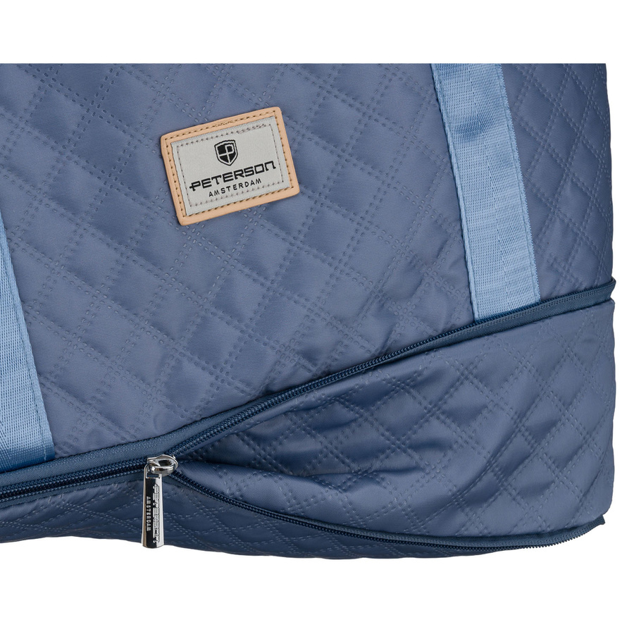 Treningowa torba wykonana z poliestru w niebieskim kolorze, wyposażona w uchwyt na walizkę - Peterson