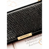 Duży portfel damski ze skóry ekologicznej w czarnym kolorze zamykany na zatrzask - Rovicky